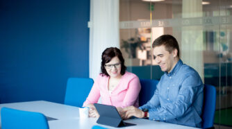 Young man and a woman at a meeting