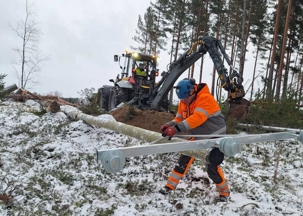 Men at work to repair the network damages after the storm