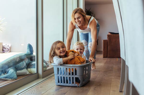 Mother and two kids playing